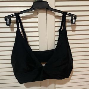 Women’s Black Triangle Aerie Top.
